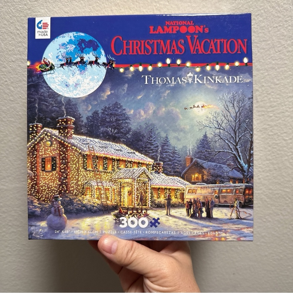 Thomas Kinkade Christmas Vacation Puzzle with Blue and White Accents